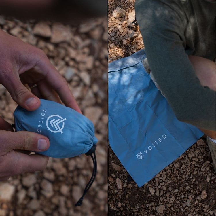A split-screen lifestyle photo showing a light blue Voited drawstring pouch being held by hands on the left, and laid on rocky ground next to a person's leg on the right. The pouch features the white Voited logo.